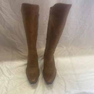 Ariat womens boots size 10. Like new condition. Zip sides over the knee.